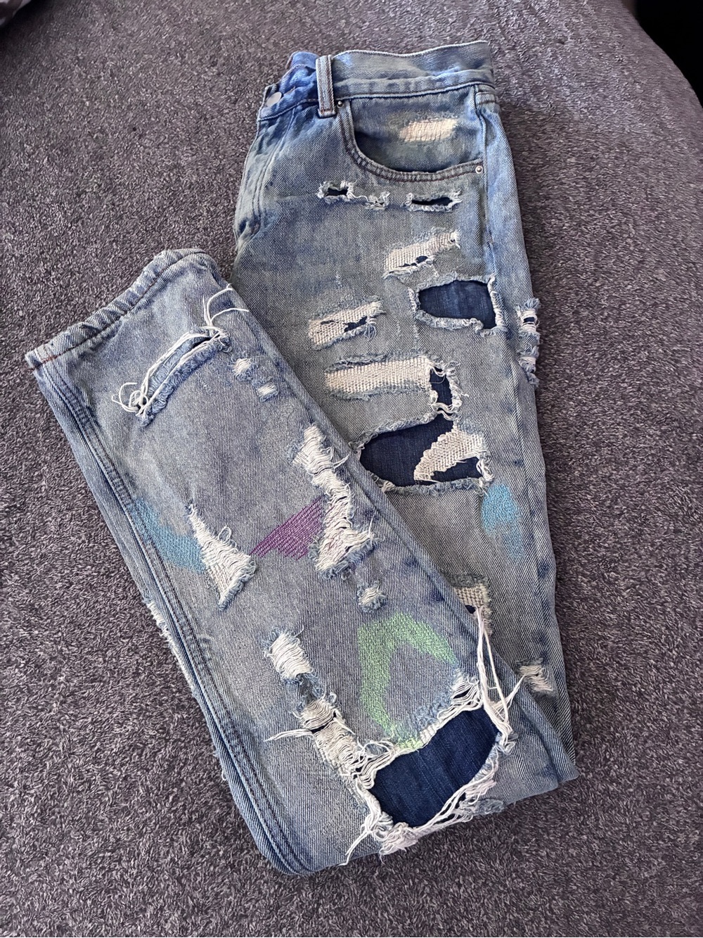 MNML Light Blue Distressed Jeans with Multicolor Paint Accents